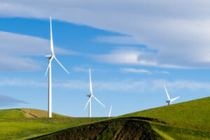 Wind turbines on a green hills