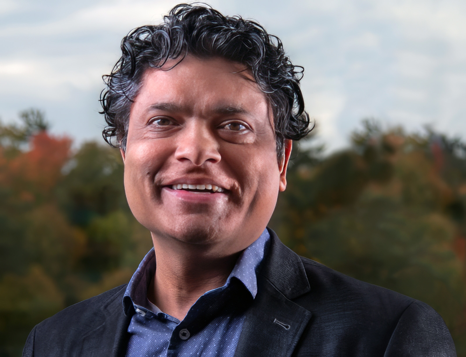 A photo of Hashmat Khan, Associate Vice-President (Academic Programs and Strategic Initiatives), Full Professor, and Co-Director of the CMFE in Economics at Carleton University in Ottawa, Ontario, Canada.