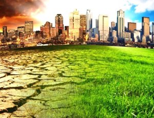 city landscape leftside is dark dreary and rightside green sunshine