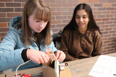 Two students participating in a STEM activity