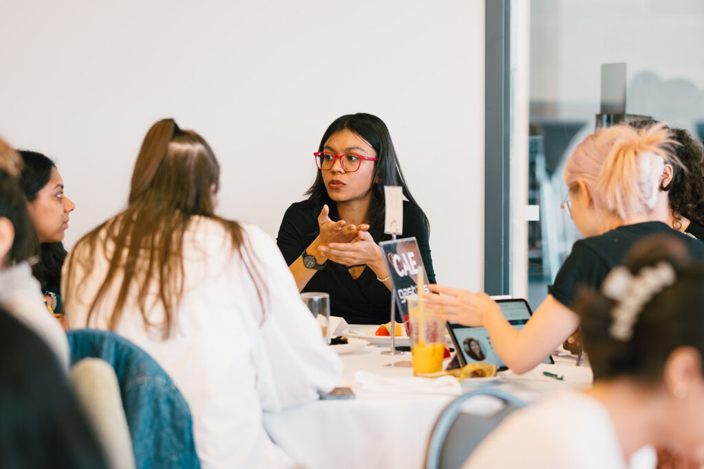 Group of students exchanging ideas in a women circle. 