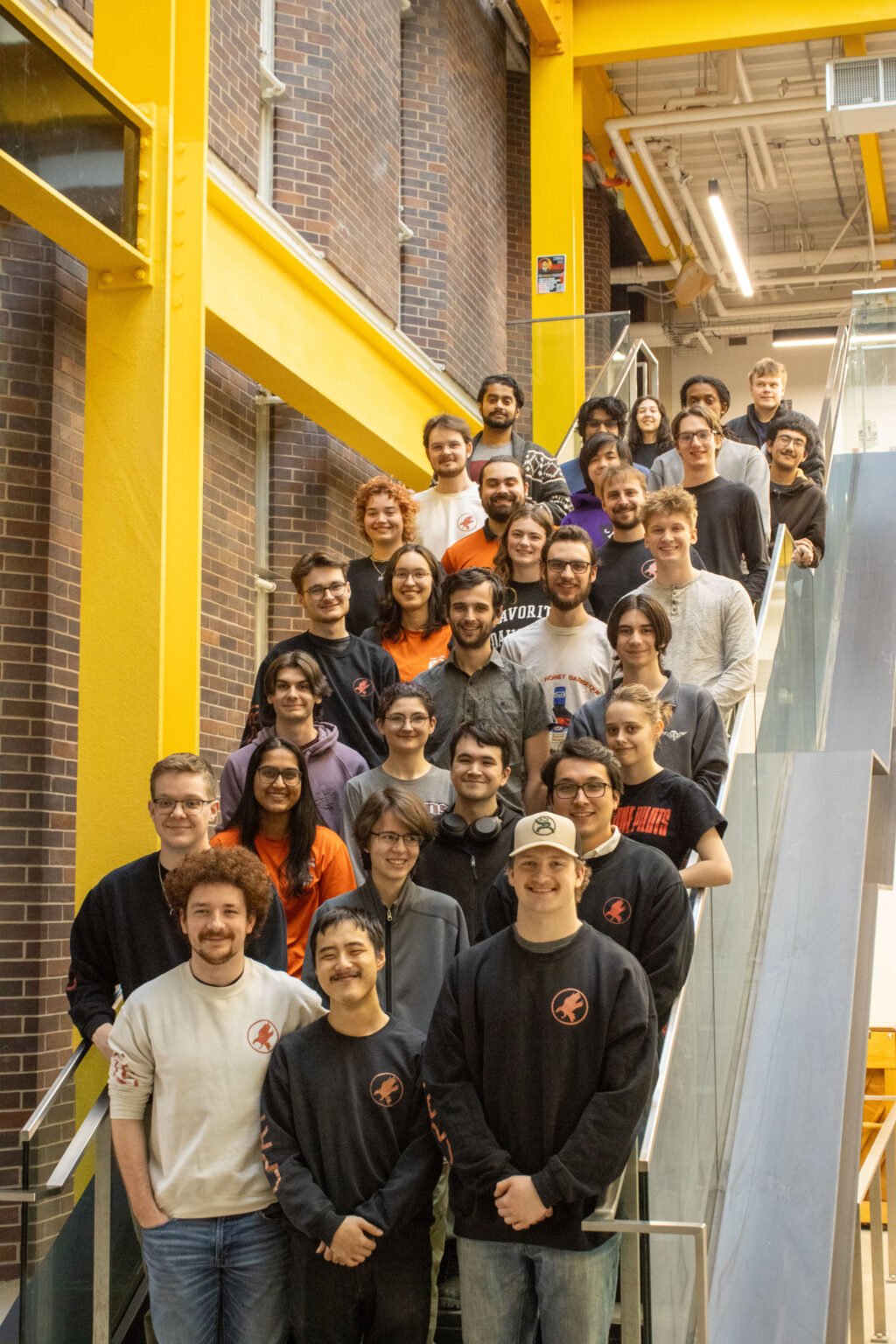 Group photo of the Carleton Planetary Robotics team, posing in the EDC staircase. 