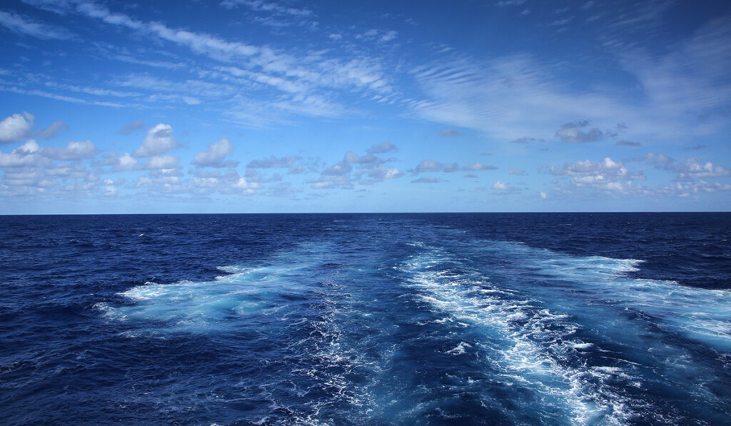 Atlantic ocean with cloudy blue sky