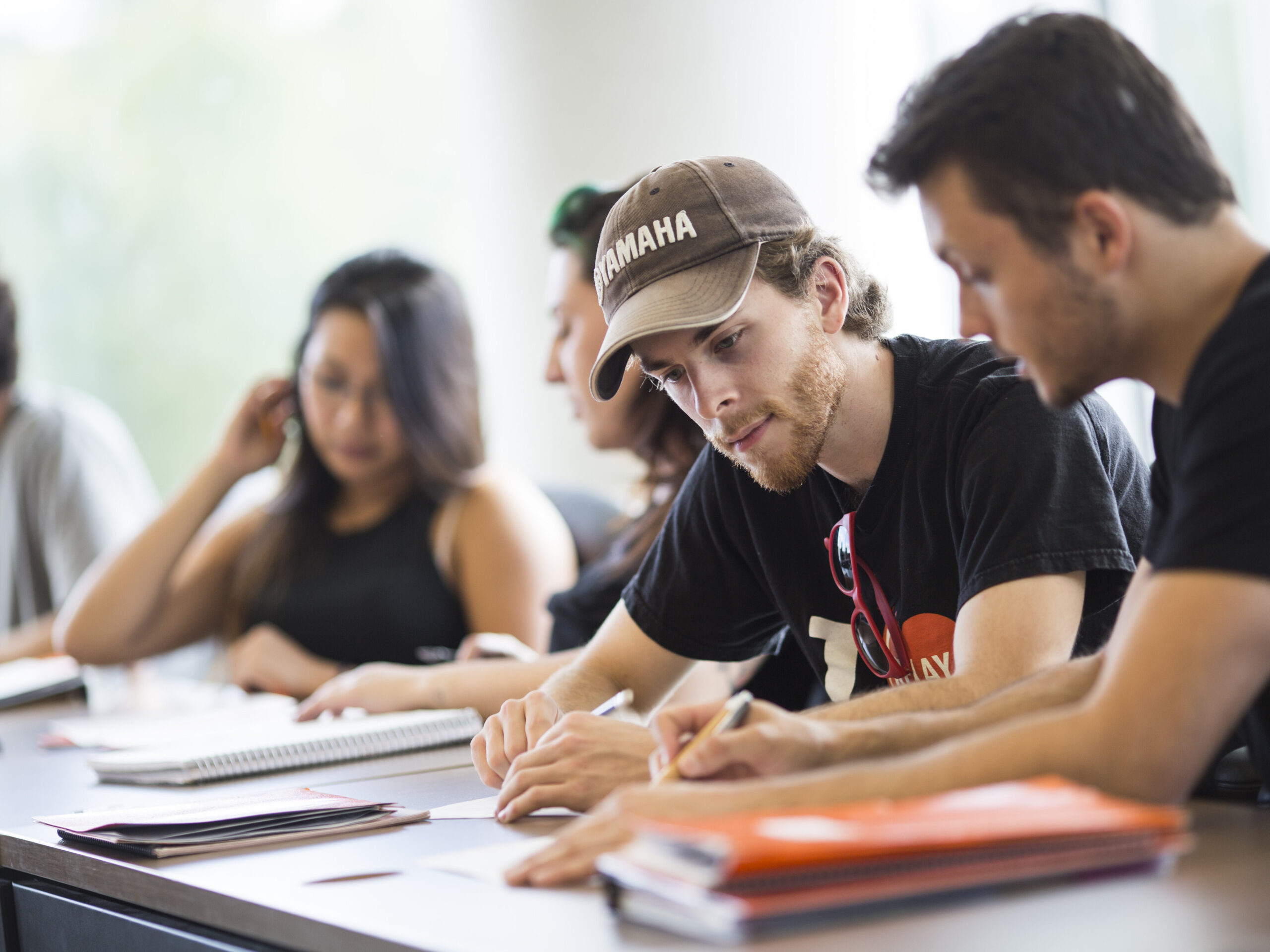 University students in the Enriched Support Program working together in a classroom.