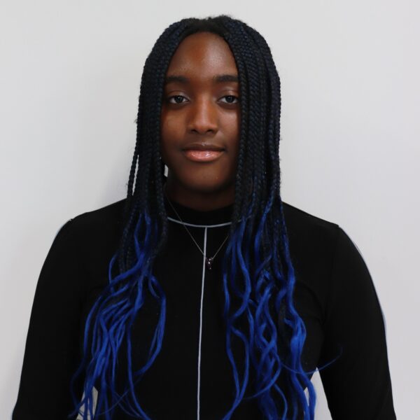 Smiling photo of student administrative assistant Tamar Iyoho.