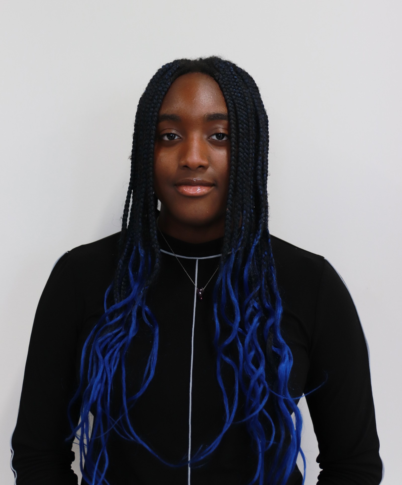 Smiling photo of student administrative assistant Tamar Iyoho.