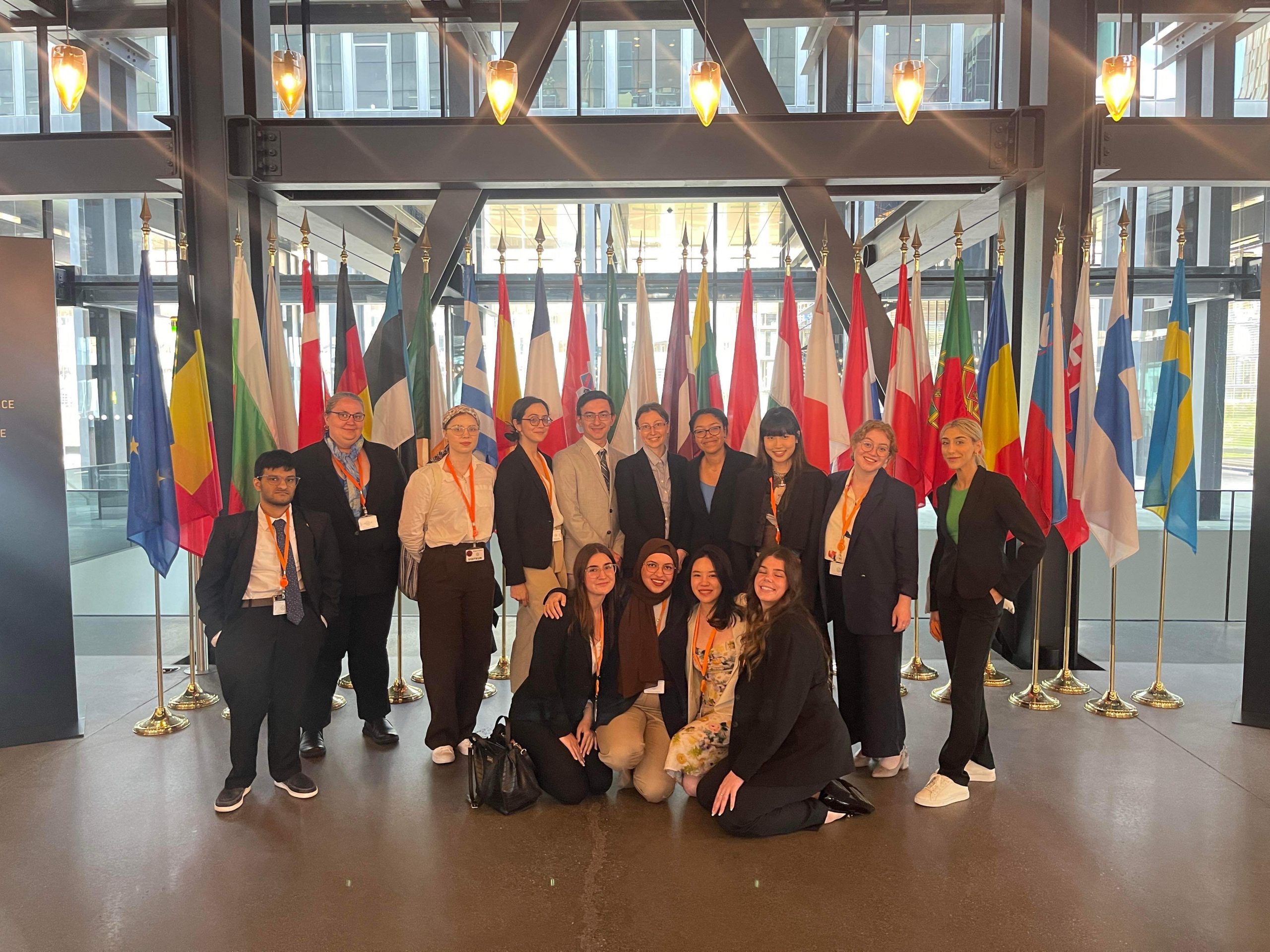 Participants of the EU Study Tour posting for a group photo in an EU Institution 