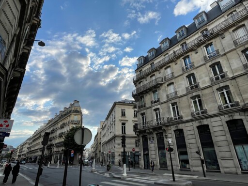 Typical Hausmann-style buildings on a street in Paris.