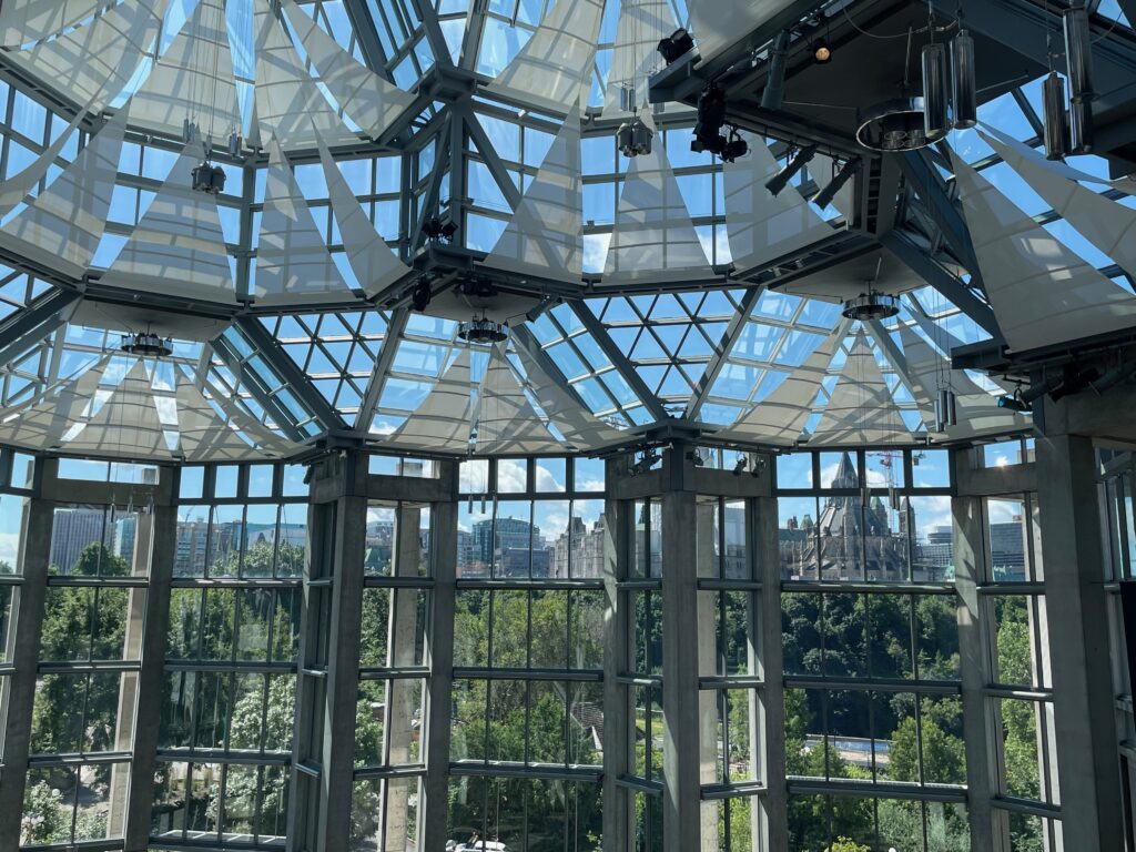 View of Major's Hill Park and the Parliamentary Library from inside the National Gallery.
