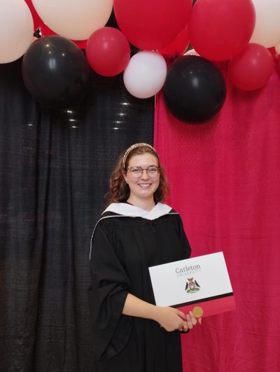 Portrait of student at graduation.