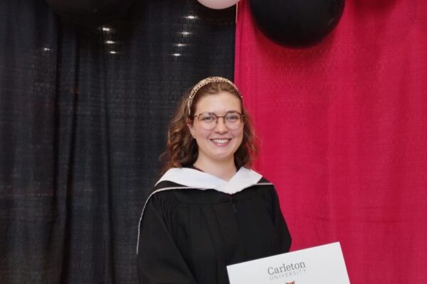 Portrait of student at graduation.