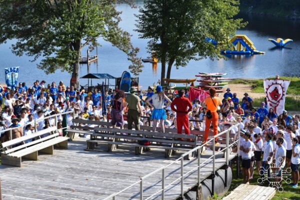 Large group of students at beach day.