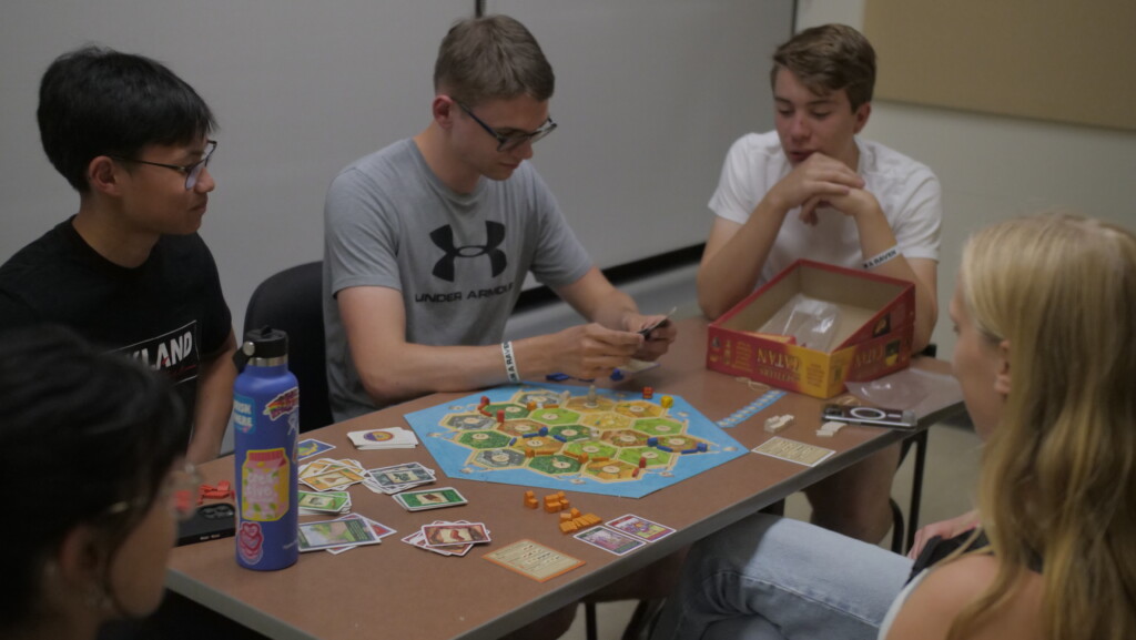 Students playing board games.