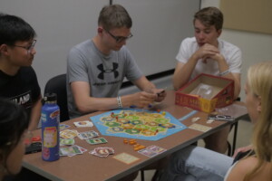 Students playing board games.