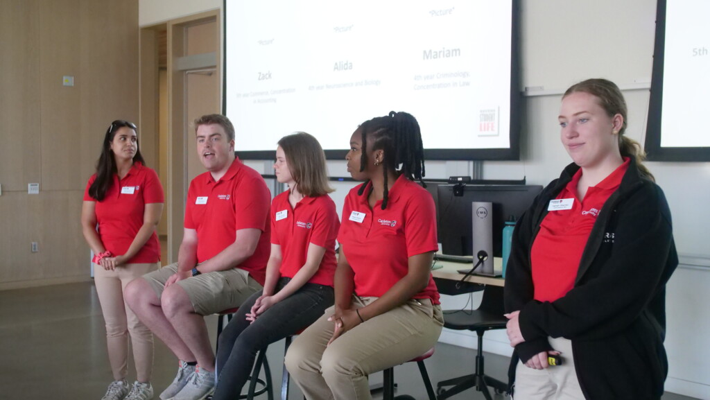 Student sitting on a panel.