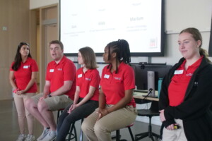 Student sitting on a panel.