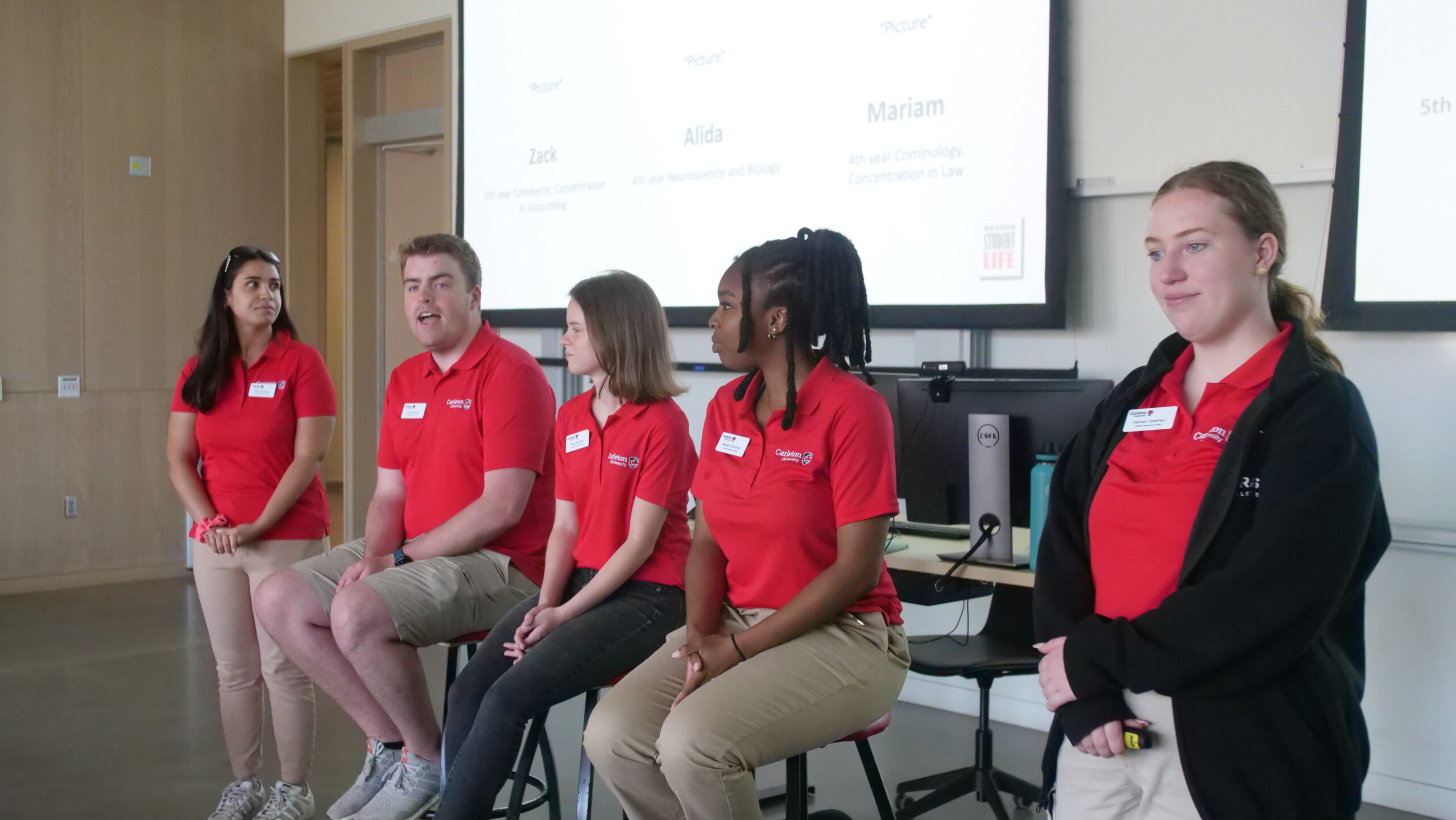 Student sitting on a panel.