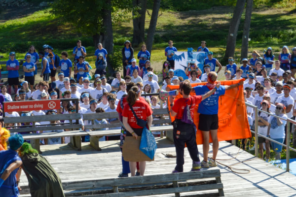 Large group of students at beach day.