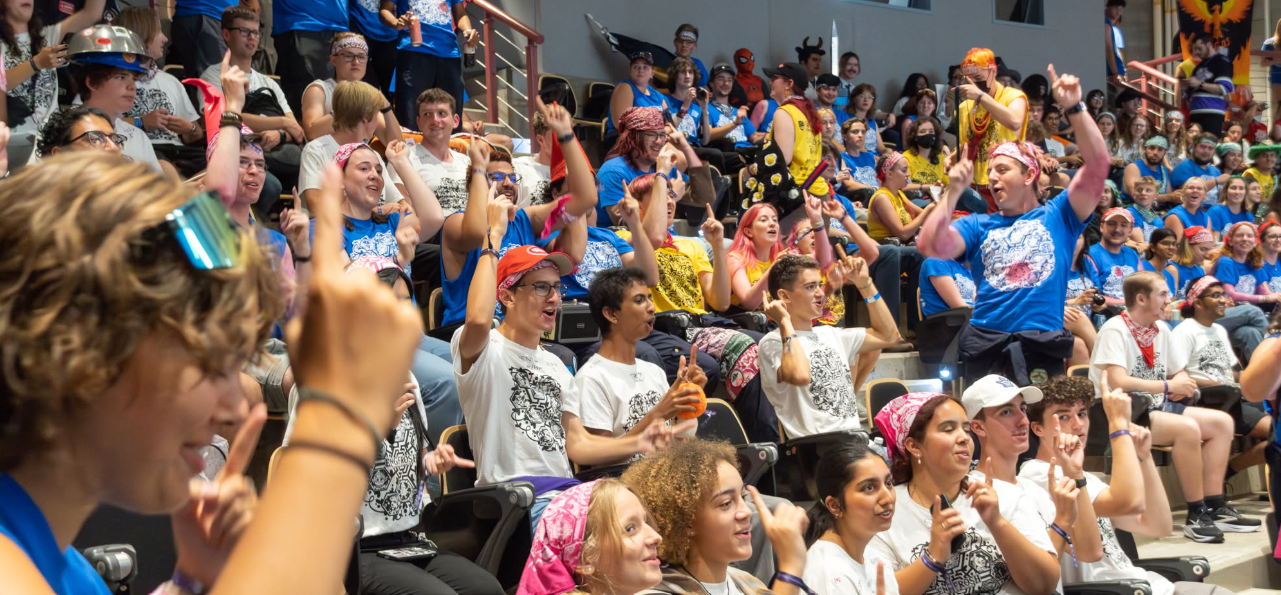 Students cheering from their seats.