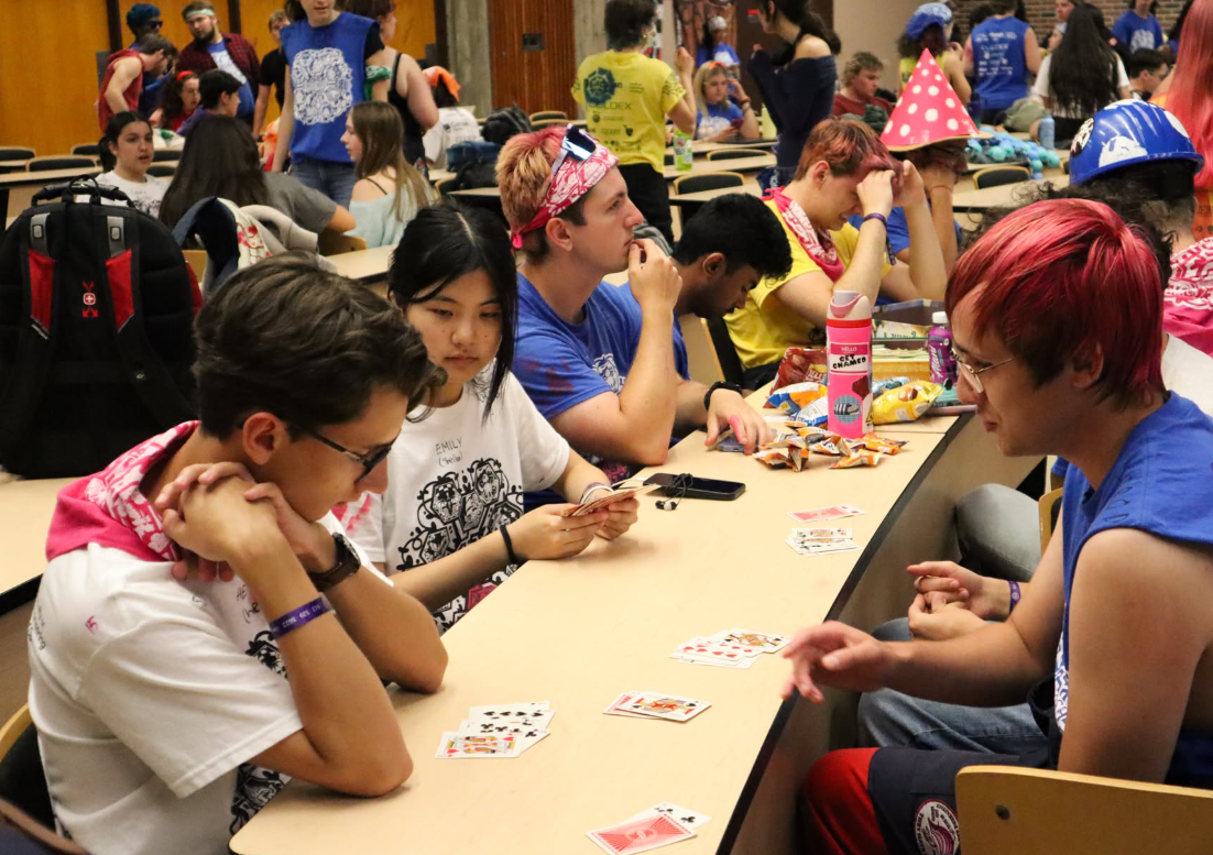 Students playing card games.