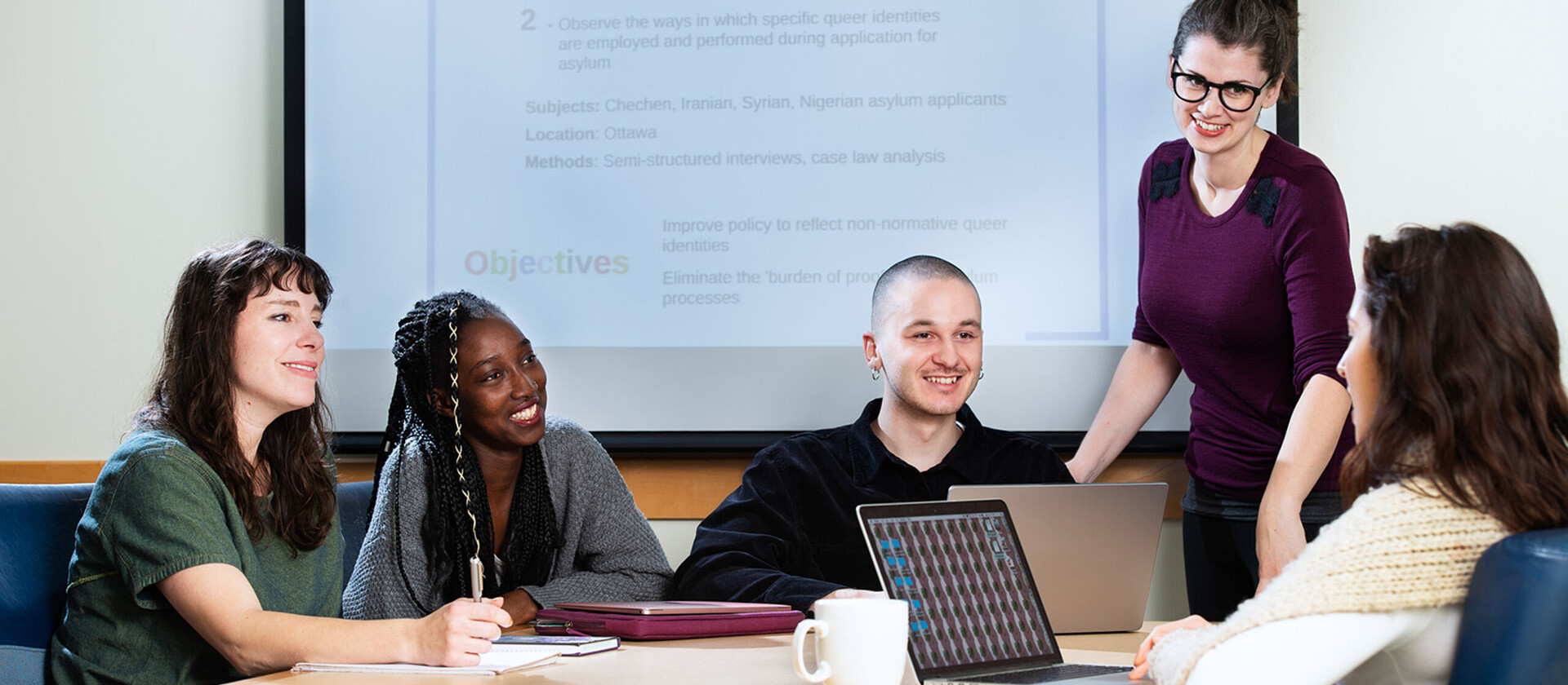 shape societal futures, students sitting around a table