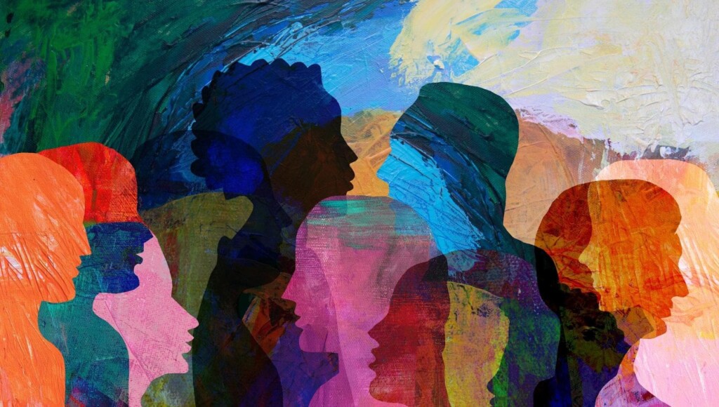 An illustration of colourful overlapping silhouettes of different people
