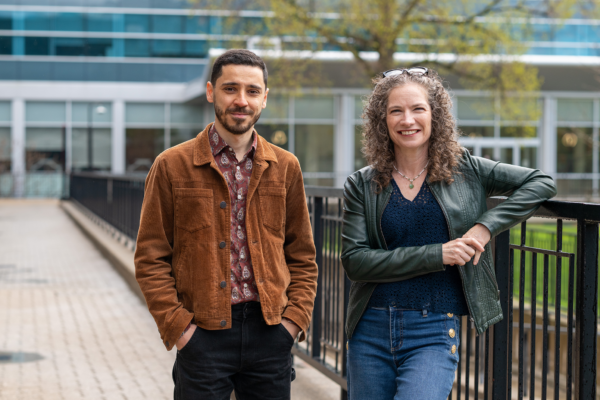 Cihan Erdal and Jacqueline Kennelly standing in the Carleton quad