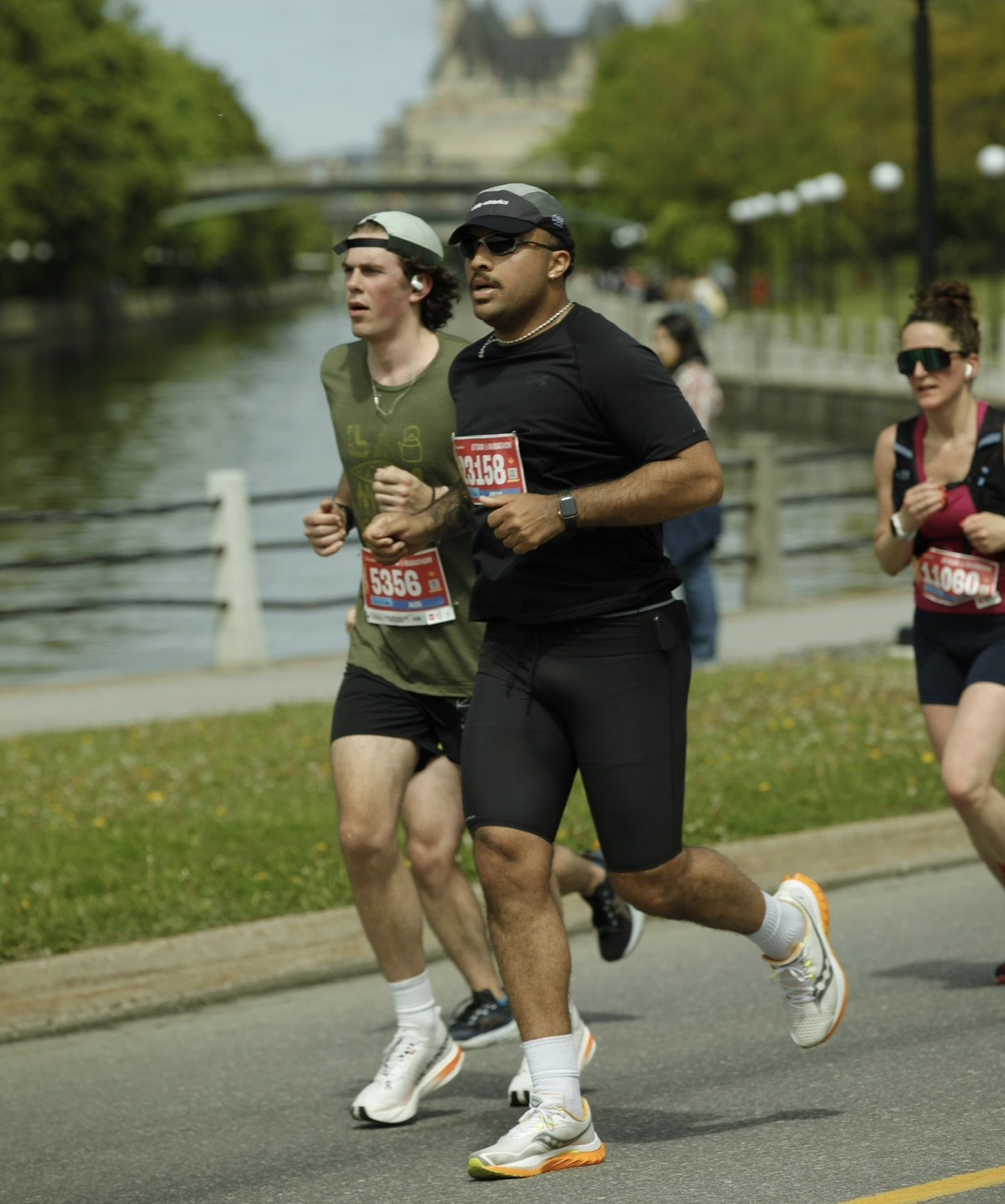 Student wearing all black running in marathon