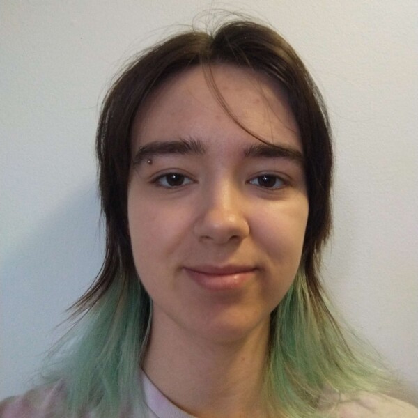 Student with brown and green hair