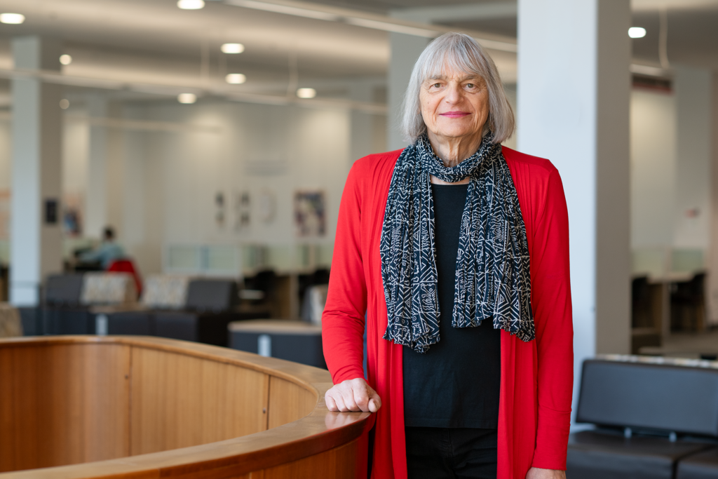 Tara Sypniewski standing in the MacOdrum Library at Carleton University.