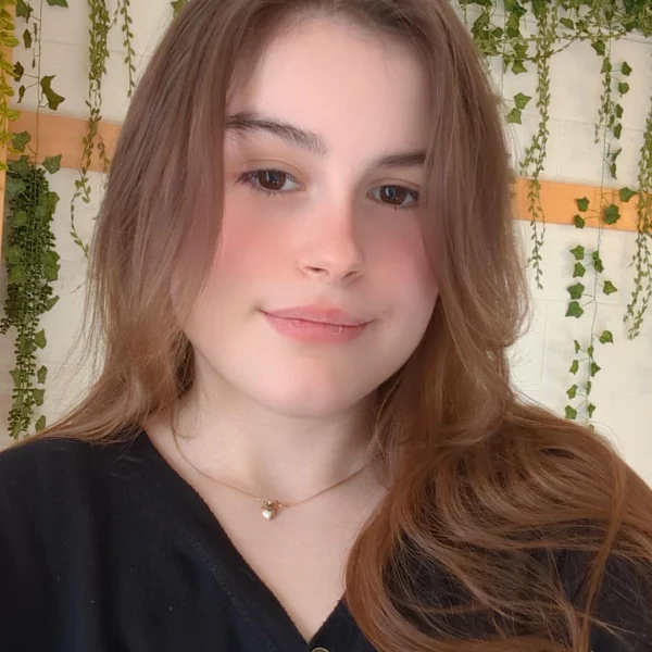 Student ambassador with brown hair and black sweater