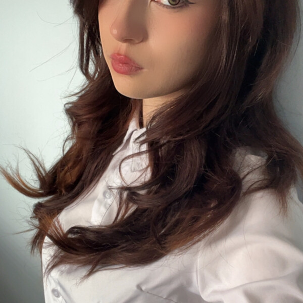 Student Ambassador with brown hair and white blouse