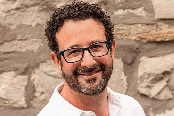 A headshot photo of Michael Wohl.