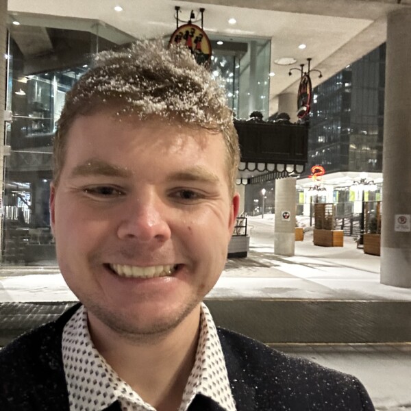 Student ambassador standing in snow