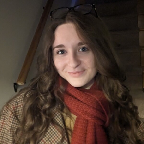 student ambassador in coat and scarf