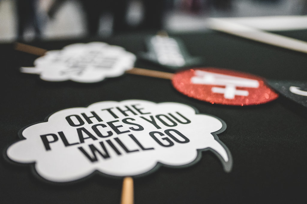 a cloud sign that says "oh the places you'll go"