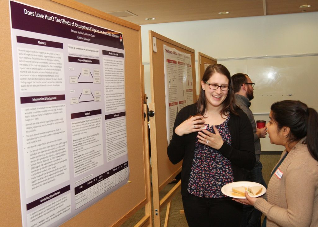 Amanda McEvoy presenting her poster titled, “Does Love Hurt? The Effects of Occupational Injuries on Romantic Partners.”