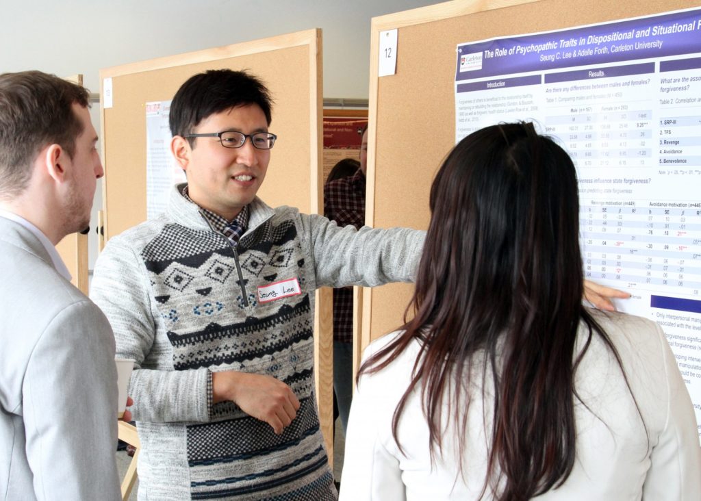 Seung Lee presenting his poster titled, “The Role of Psychopathic Traits in Dispositional and Situational Forgiveness.”