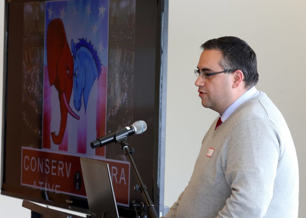 Kris Merrells presenting his research titled, “Principle or Self-Interest? Examining Attitudes towards Affirmative Action.”