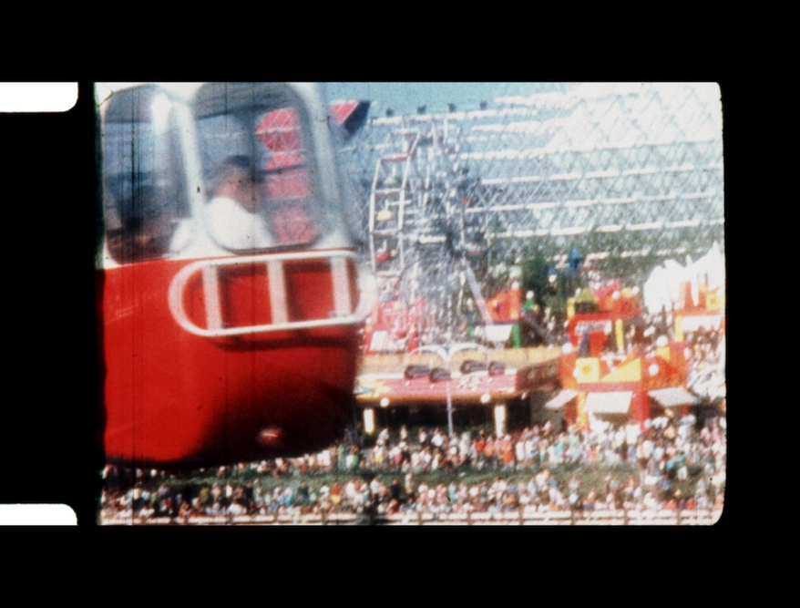 Film image of mid-century fairground rides
