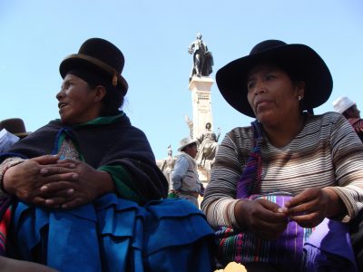 Two indigenous women conversing during the TIPNIS protest vigil in the Plaza Murillo, La Paz, Bolivia. On the right is indigenous activist Toribia Lero and on the left is indigenous authority Catalina Molina. Photo taken, October 2011.