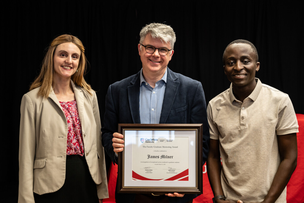 James Milner with students and the Graduate Mentoring Awards