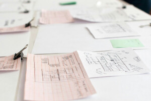 Photo of various brainstorming documents on a table