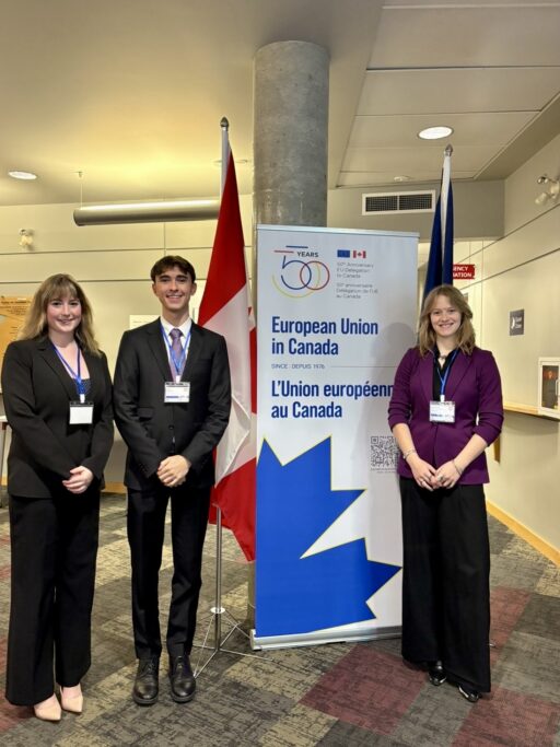 Three Carleton Political Science students pose at the Canadian Model EU