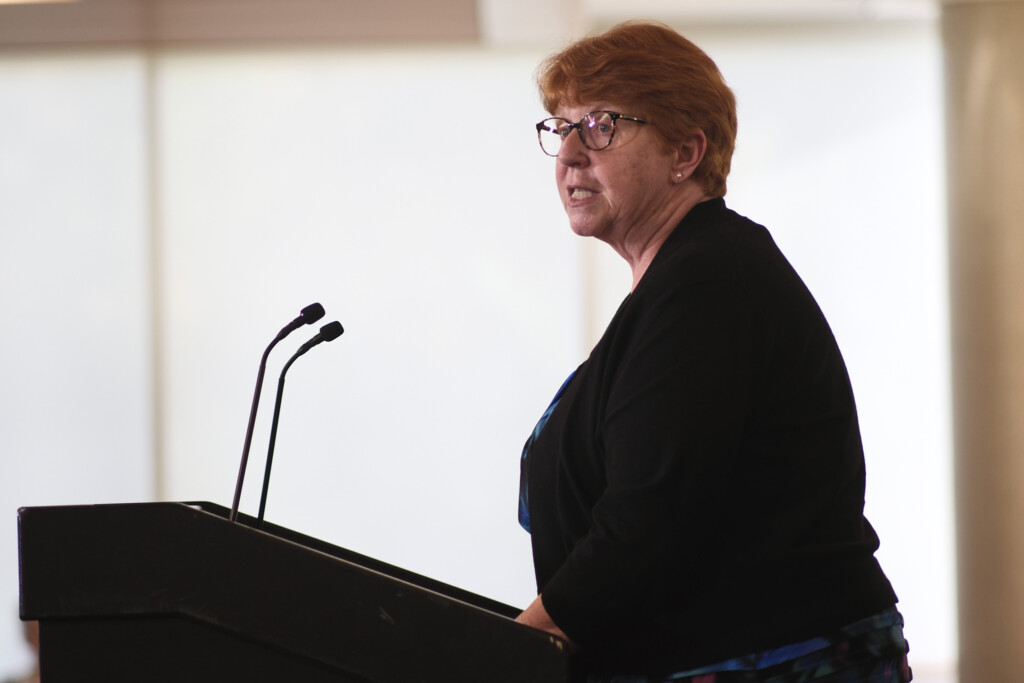 Pauline Rankin speaks at the podium