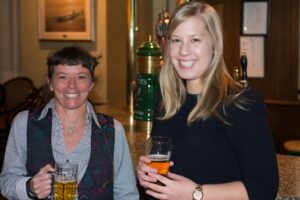 Zoe Panchen and Melissa Nacke relaxing at the bar after presenting