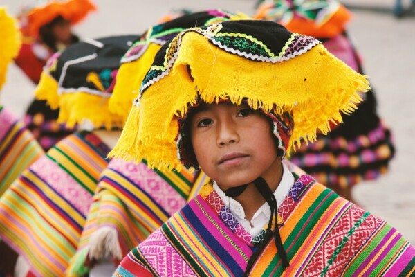 A Peruvian boy dressed in traditional clothing