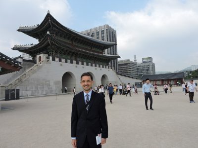 Marcel Jesensky standng in front of building in Seoul