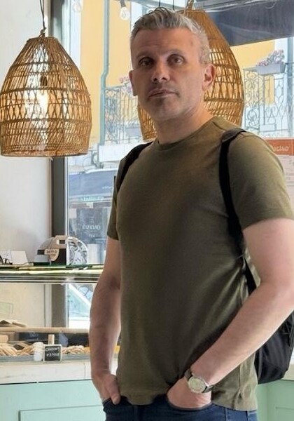 Hussam Ahmed standing