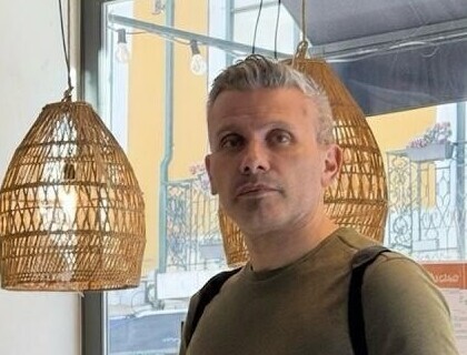 Hussam Ahmed standing